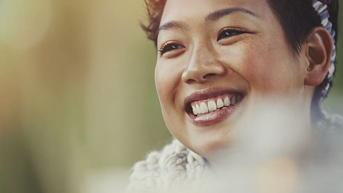 woman smiling brightly