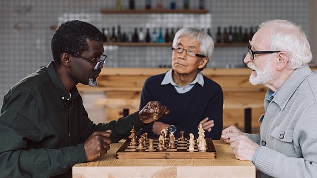 two people playing chess