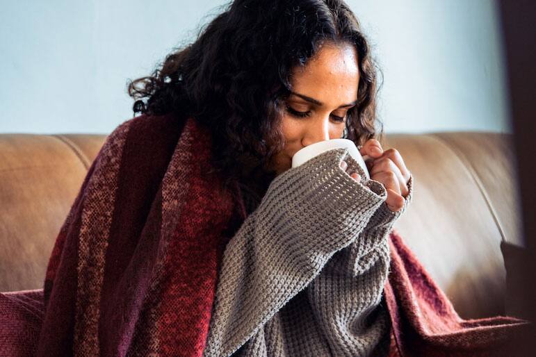 girl drinking hot tea