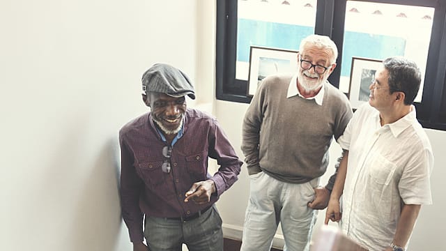 A group of three elderly men