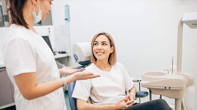 young caucasian woman listening to doctor's recommendations 