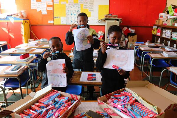 Children learning how to brush their teeth