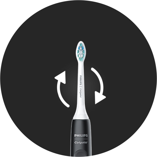 Mujer cepillándose con Colgate Philips SonicPro Mujer cepillándose con Colgate Philips SonicPro