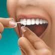 Salud Bucal paso 2 para usar el hilo dental