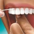 Salud Bucal paso 3 para usar el hilo dental
