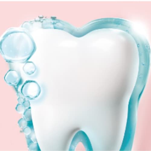 Close up of tooth surrounded by protective layer and bubbles