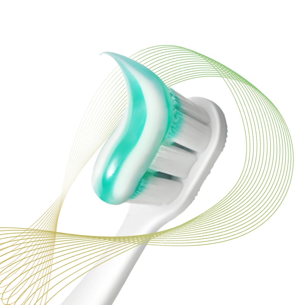 The Colgate Total toothbrush head with paste on it, surrounded by multi-coloured prevention rays