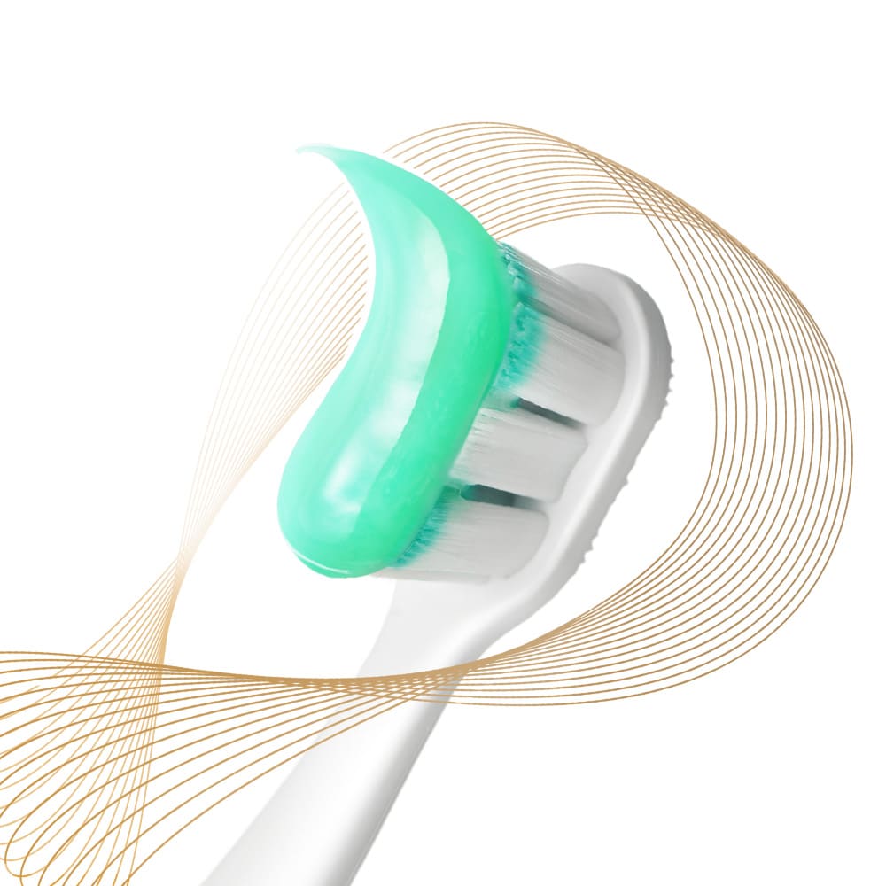 The Colgate Total toothbrush head with paste on it, surrounded by multi-coloured prevention rays