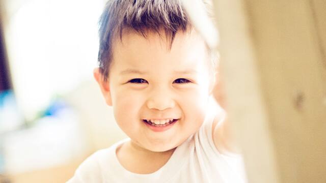 a boy smiling