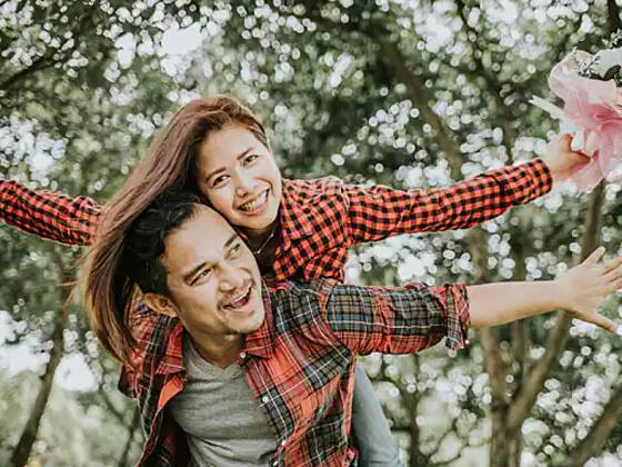 smiling couple at a park