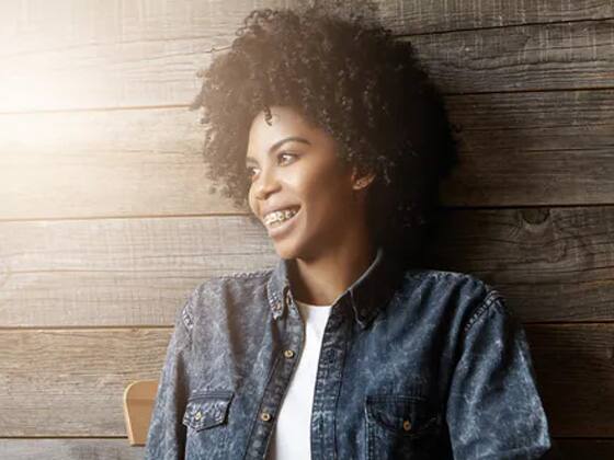 woman smiling after using colgate