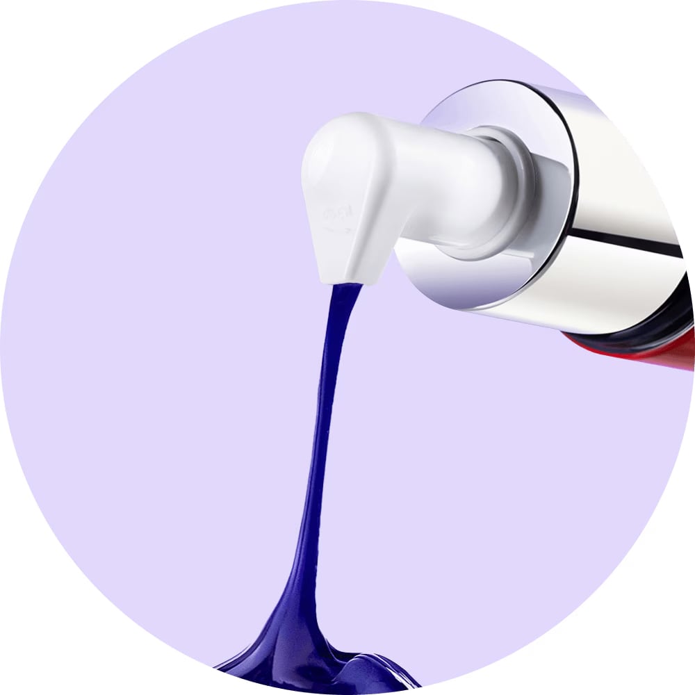 Slick & smooth Optic White Purple Serum dispensed from a pump bottle